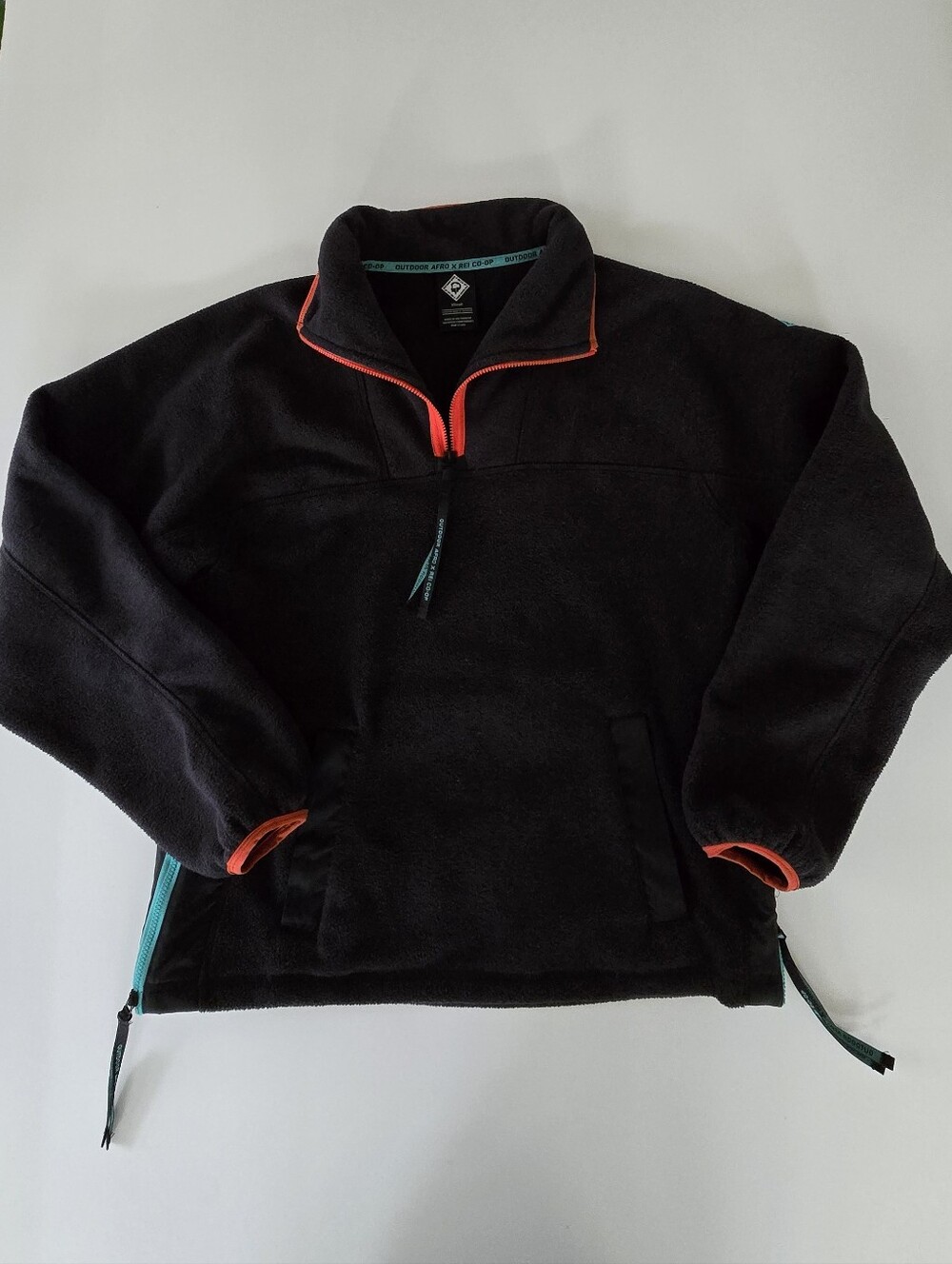 Outdoor Afro REI Black Fleece Pullover with Orange Trim